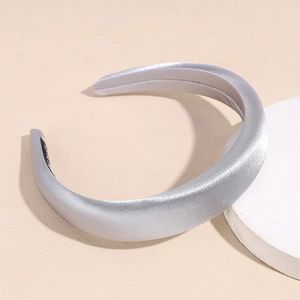 Detail of silver grey satin sponge headband with smooth pearl texture and non-slip inner layer
