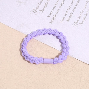 Detailed close-up of a lavender purple braided hair tie with a durable elastic weave