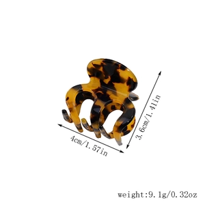 Vue détaillée de la pince à cheveux écaille de tortue montrant dimensions et ressort