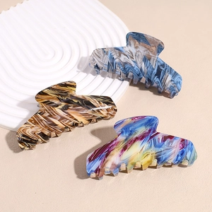 Set di tre mollette per capelli in acetato con motivi marmorizzati blu, marroni e colorati