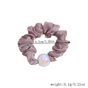 Close-up of lilac ruffled satin hair scrunchie with iridescent pearl and size dimensions