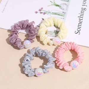 Set of four organza hair scrunchies with iridescent pearls in pastel colors