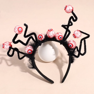 Halloween black fuzzy headband featuring creepy red bloodshot eyeballs and feather accents