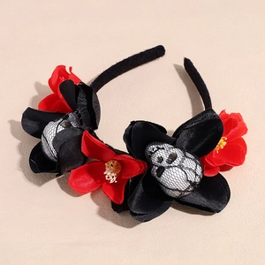 Halloween floral headband with black roses, red flowers, and skull accents for party decor