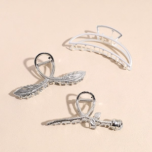 Three-piece silver metal hair claw set featuring minimalist geometric, feather, and rose designs
