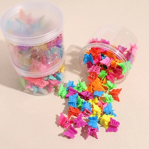 Colorful mini butterfly hair clips for kids in two transparent storage containers