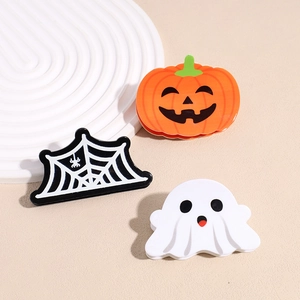 Three-piece Halloween hair clip set with pumpkin, spider web, and ghost designs