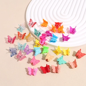 Colorful mini butterfly hair clips in various bright colors for kids and women