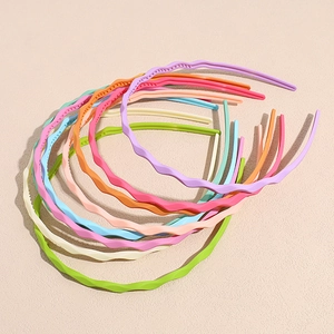 Set of wavy candy-colored non-slip headbands for women and girls in seven pastel shades