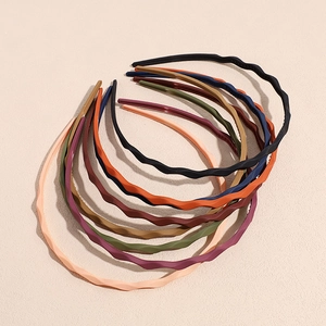 Set of wavy candy-colored thin headbands for women and girls in multi-color matte finish