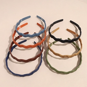 Set of 7 matte wavy non-slip headbands with inner teeth in assorted solid colors
