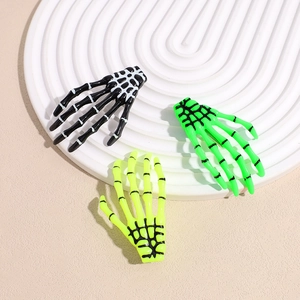 Pinces à cheveux main de squelette noires, vert fluo et jaunes pour Halloween