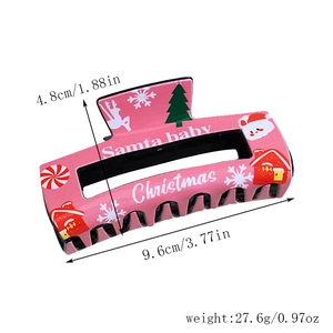 Detailed dimensions of the pink Christmas hair claw clip with holiday patterns and text