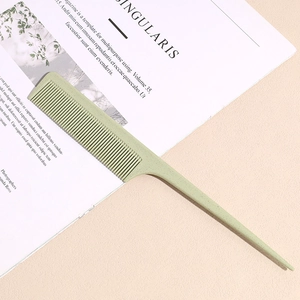 Macro detail of a light green wheat straw tail comb for precise hair styling and parting
