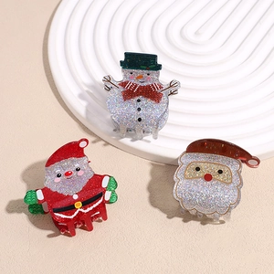 Three-piece Christmas hair claw set with glittery Santa and snowman designs for women