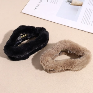 Plush faux fur cloud claw clips in black and khaki for autumn winter hair styling