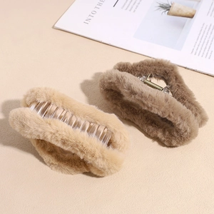 Detail showing plush beige and dark coffee hair claws with soft faux fur texture