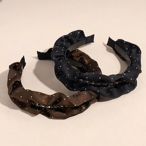 Elegant ruffled velvet headband set with sparkling rhinestones in black and brown colors