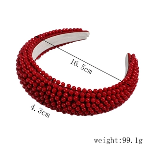 Detailed macro view of red pearl sponge headband with 16.5cm diameter and 4.3cm width