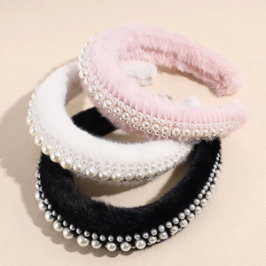 Three-piece set of thick plush headbands with pearls in pink, white, and black colors