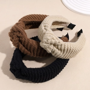 Three-color set of wide knitted headbands with center twist knot and non-slip pads