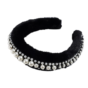 Wide plush sponge headband in black faux fur featuring elegant white pearl embellishments