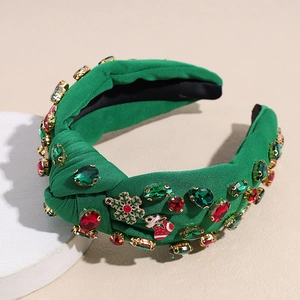 Detail des Weihnachts-Haarreifens mit Strasssteinen, Metall-Schneeflocken und festlichem Knoten