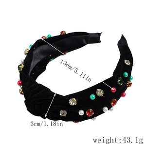 Vue détaillée du serre-tête en velours noir avec strass colorés et ses dimensions