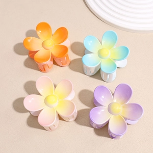 Lot de quatre pinces à cheveux fleurs dégradées en orange, bleu, rose et violet mat