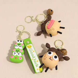 Cartoon caterpillar and character keychain with gold ring and good luck strap