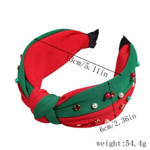 Detailed view of knotted Christmas headband with pearls and rhinestones specifications