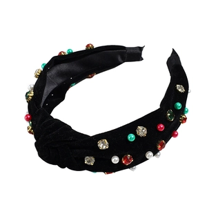 Serre-tête de Noël en velours noir avec strass et perles sur fond blanc pur