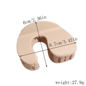 Matte beige U-shaped shark hair clip with dimensions 8.7cm by 6cm and 27.9g weight