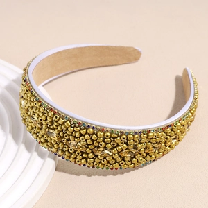 Detail of beaded wide headband with amber gemstones and vintage gold rhinestones