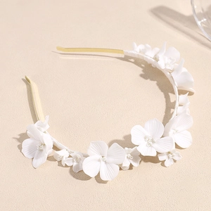 Elegant white ceramic flower bridal headband with pearls and gold wire for wedding accessory