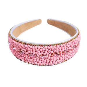 Handmade pink beaded headband with colorful rhinestones and velvet lining for women