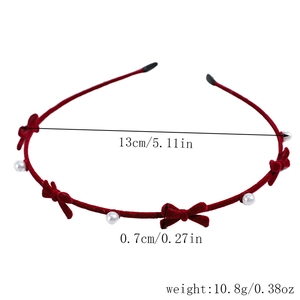 Detailed size and weight specs for red velvet bow headband with elegant pearls