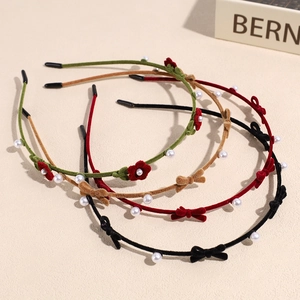 Set of 4 velvet bow headbands with faux pearls in green, red, camel, and black colors
