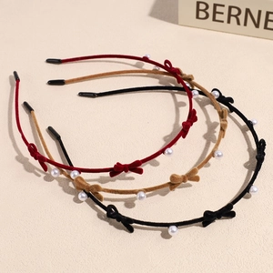 Three velvet bow headbands with pearls in burgundy, brown and black for a sweet elegant style