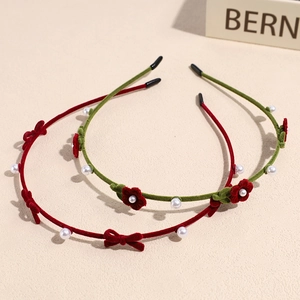 Elegant pearl velvet headbands in red and green with delicate bow and floral details