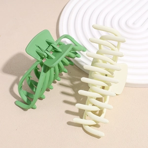 Matte macaron green and cream large octopus claw clips for long hair styling