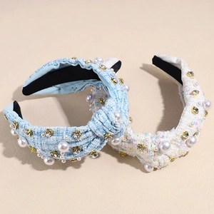 Elegant wide braided headband with white pearls and sparkling diamonds in tweed style