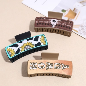 Set of three vintage PU leather hair claws with cow print and bohemian patterns