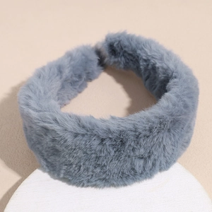 Detail shot of the thick greyish blue plush headband showing soft faux fur texture