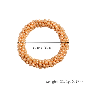 Detail view of champagne pearl hair ring with size 7cm and weight 22.2g specifications