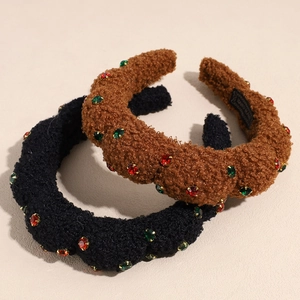 Thick plush headbands in black and brown with sparkling red and green rhinestones