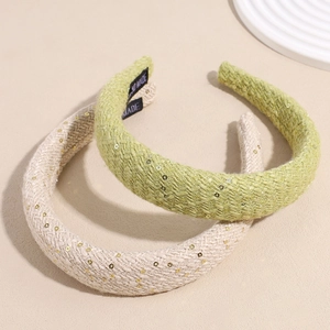Serre-têtes en tweed rembourrés avec paillettes en vert clair et crème pour look élégant