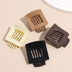 Minimalist square hollow hair claws in matte black, brown, and cream for daily styling