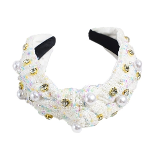 Elegant tweed knot headband with pearls and rhinestones on a clean white background