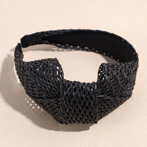 Detailed view of bohemian black raffia headband featuring intricate woven mesh textures